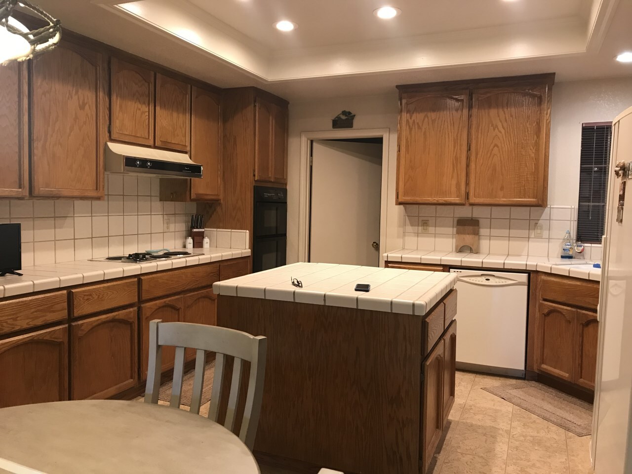 With a desire for improved efficiency and everything in its place, these homeowners chose classic good looks and a warm, inviting color palette for their Gold River, Ca. kitchen remodel. First, we removed the old cabinetry,